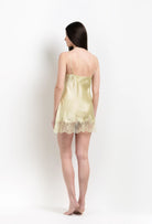 Discover the 2026 Summer collection of lingerie couture from the house Carine Gilson with this slip babydoll style straight neckline in light yellow silk with acid yellow lace