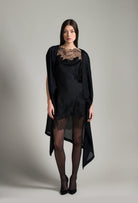 The Winter 2026-27 collection from the house Carine Gilson - The most beautiful couture lingerie to be discovered with this Midi dress with Cowl Neckline with lace in Black Silk  with Black lace