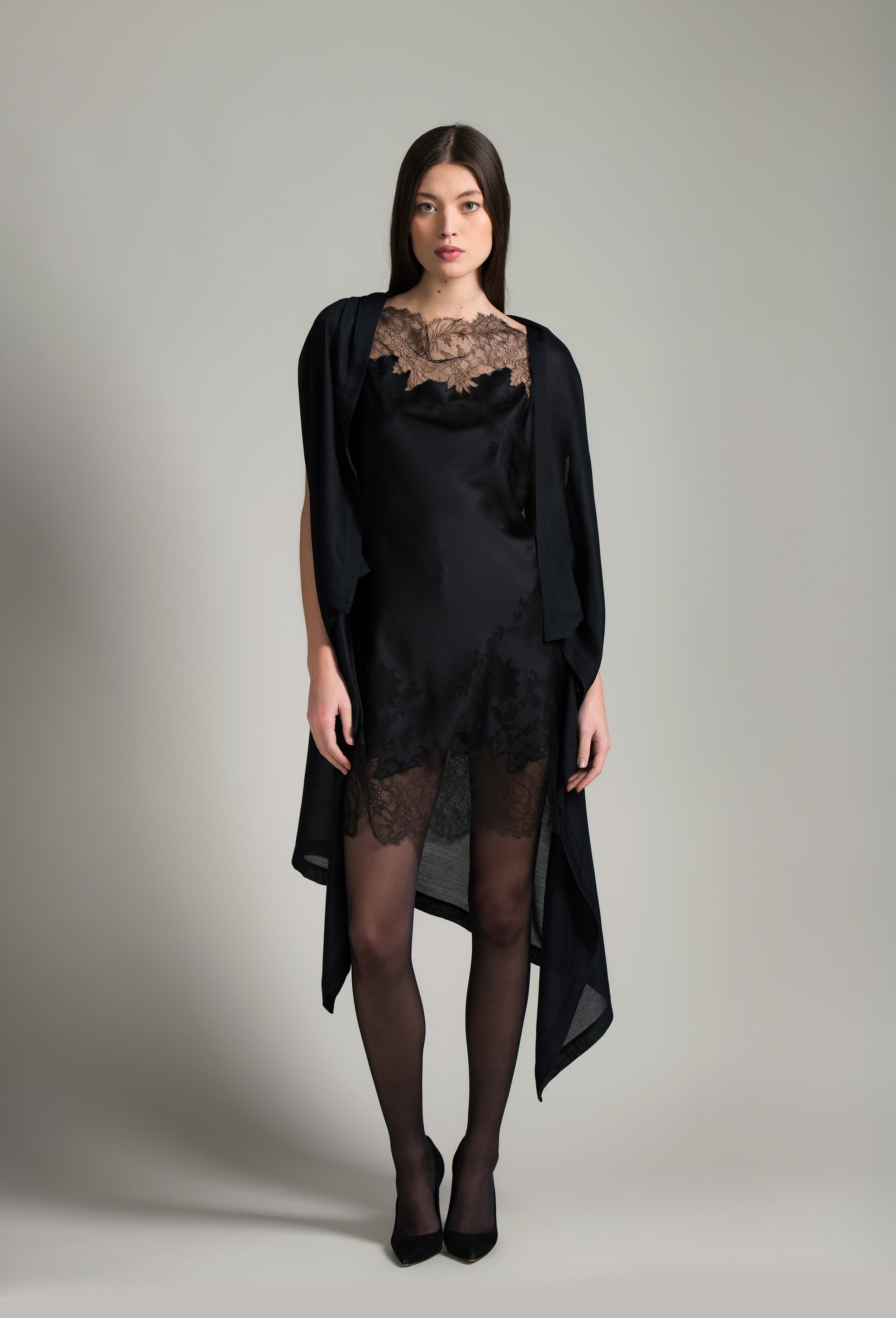 The Winter 2026-27 collection from the house Carine Gilson - The most beautiful couture lingerie to be discovered with this Midi dress with Cowl Neckline with lace in Black Silk  with Black lace