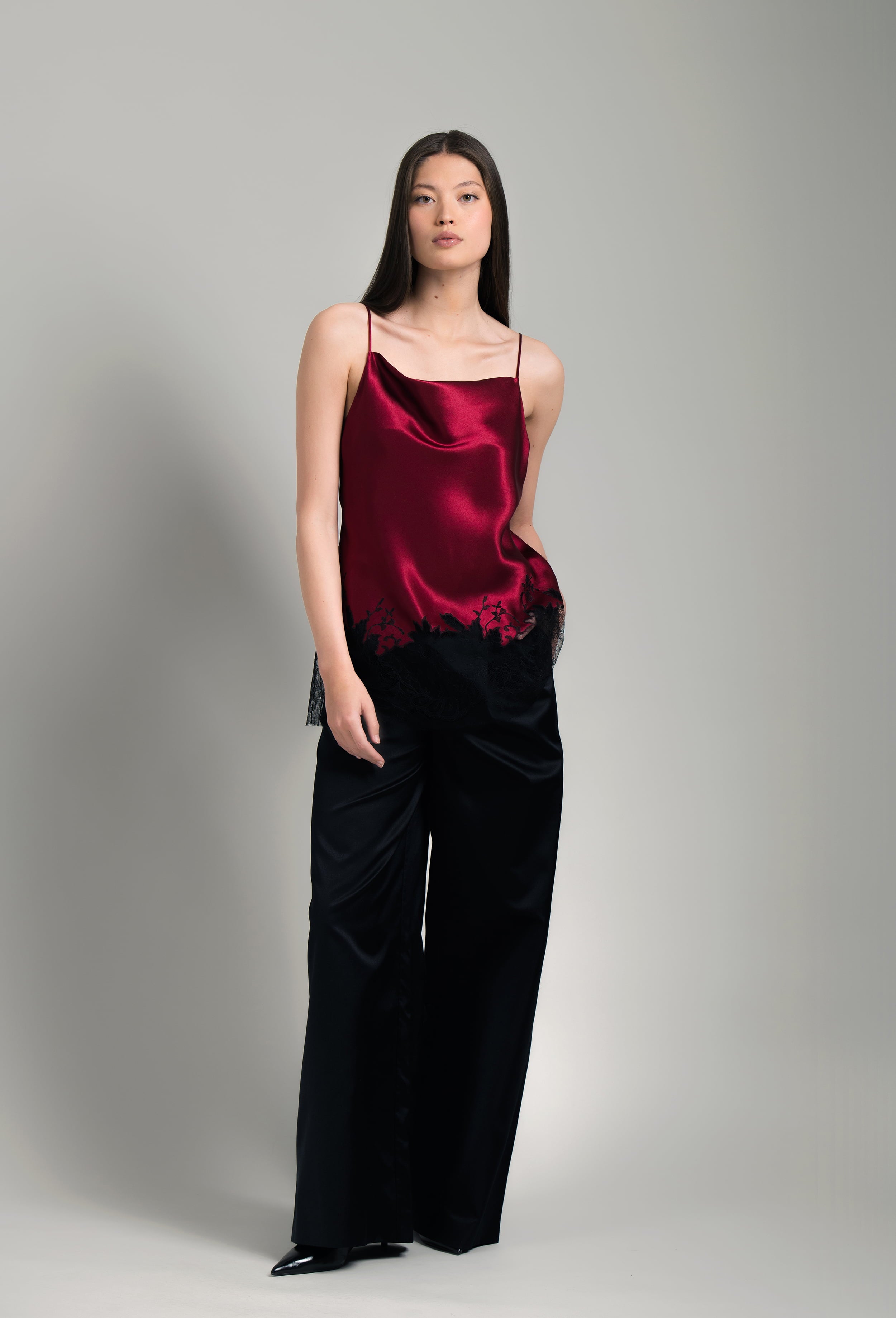 Made of silk and lace, explore the lingerie collection Winter 2026-27 from the house Carine Gilson with this Long top with Scoop Neckline in Rubis red Silk  with Black lace