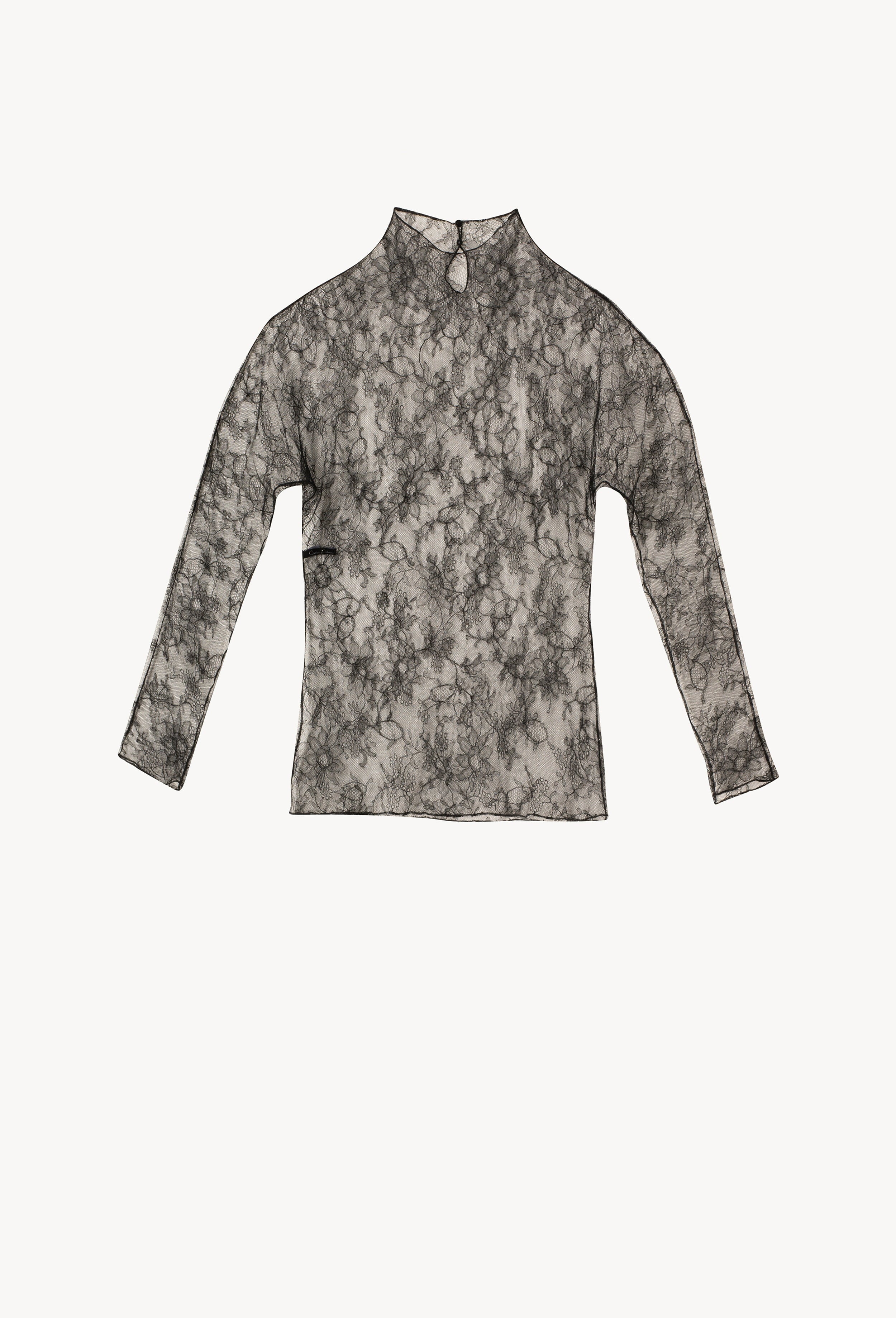 The Winter 2026-27 collection from the house Carine Gilson - The most beautiful couture lingerie to be discovered with this Long sleeves top in Black Silk lace