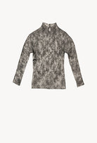 The Winter 2026-27 collection from the house Carine Gilson - The most beautiful couture lingerie to be discovered with this Long sleeves top in Black Silk lace