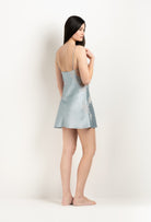Discover the 2025 Winter collection of lingerie couture from the house Carine Gilson with this Slip Babydoll Style Straight Neckline in Frozen blue Silk  with ivory lace