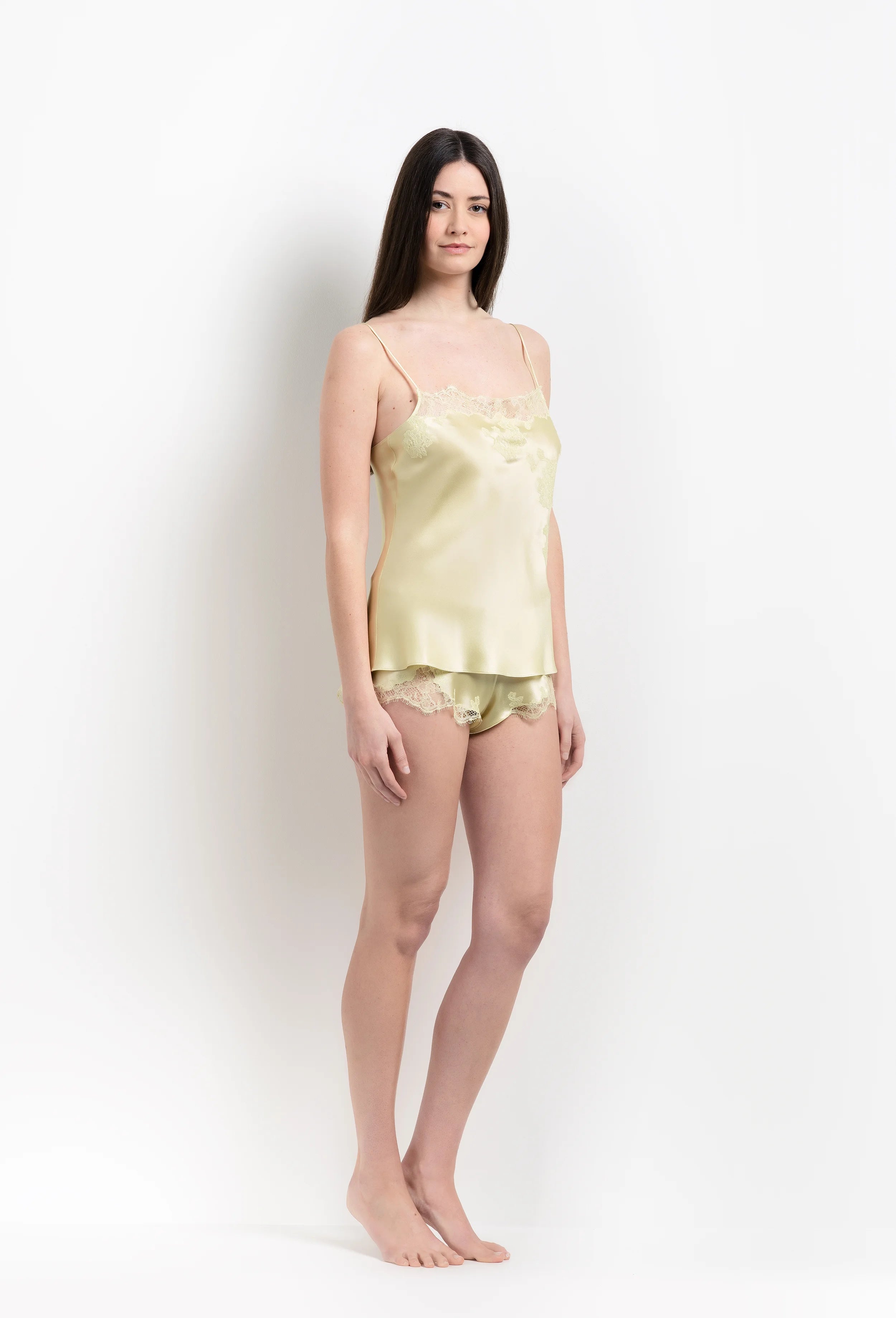 Made of silk and lace, explore the lingerie collection 2026 Summer from the house Carine Gilson with this camisole straight neckline in light yellow silk with acid yellow lac
