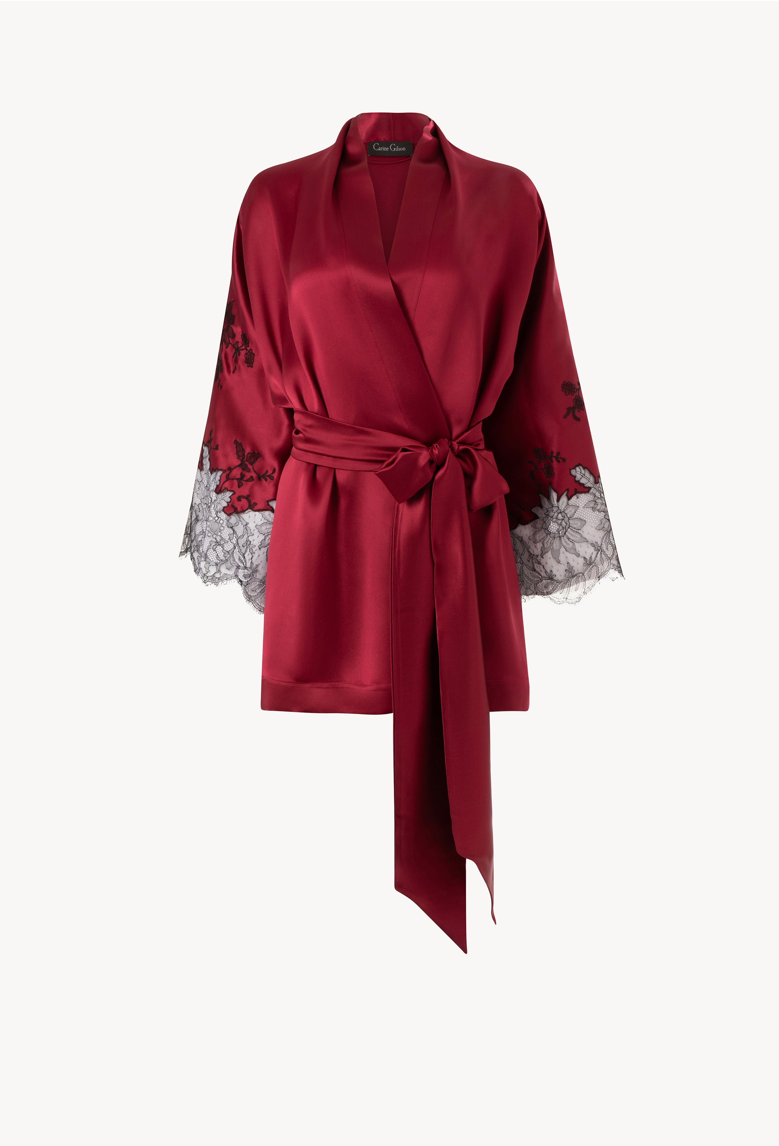 Discover the Winter 2026-27 collection of lingerie couture from the house Carine Gilson with this Short Kimono Raglan Style in Rubis red Silk  with Black lace