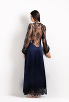 Discover the unique craftmanship of the belgian designer Carine Gilson in her atelier for the 2026 Cruise collection with this Long Déshabillé Cache-Coeur Style Silk Satin in Dark Marine Blue Silk  with black lace