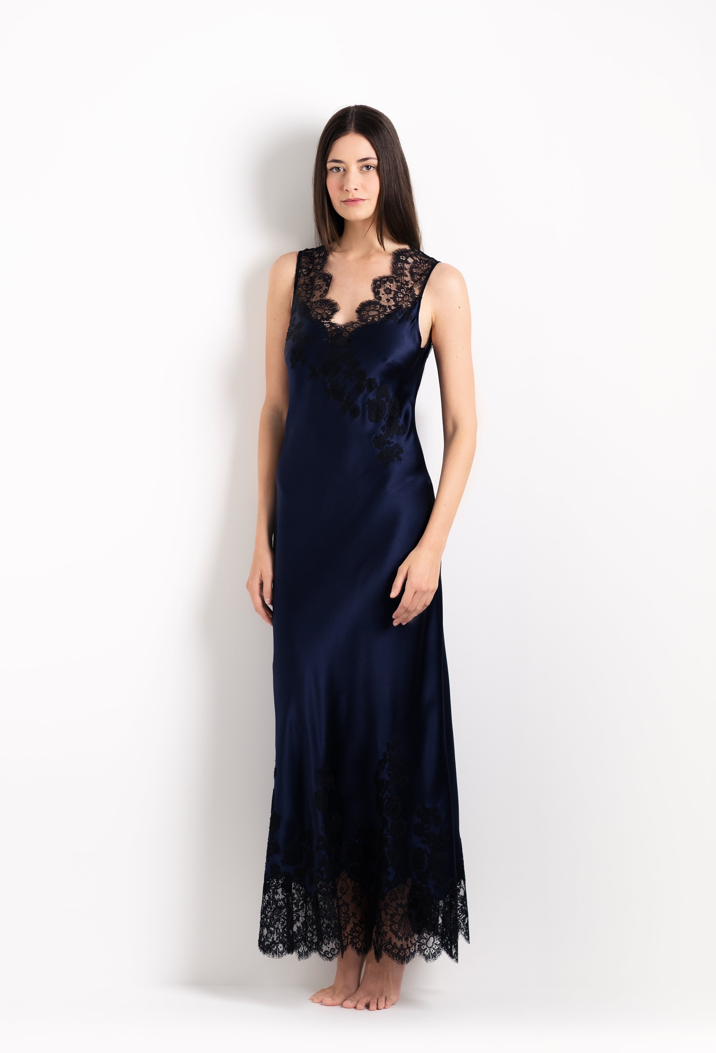 Enjoy the 2026 Cruise collection from the house Carine Gilson with this Long Gown V Neckline in Dark Marine Blue Silk  with black lace
