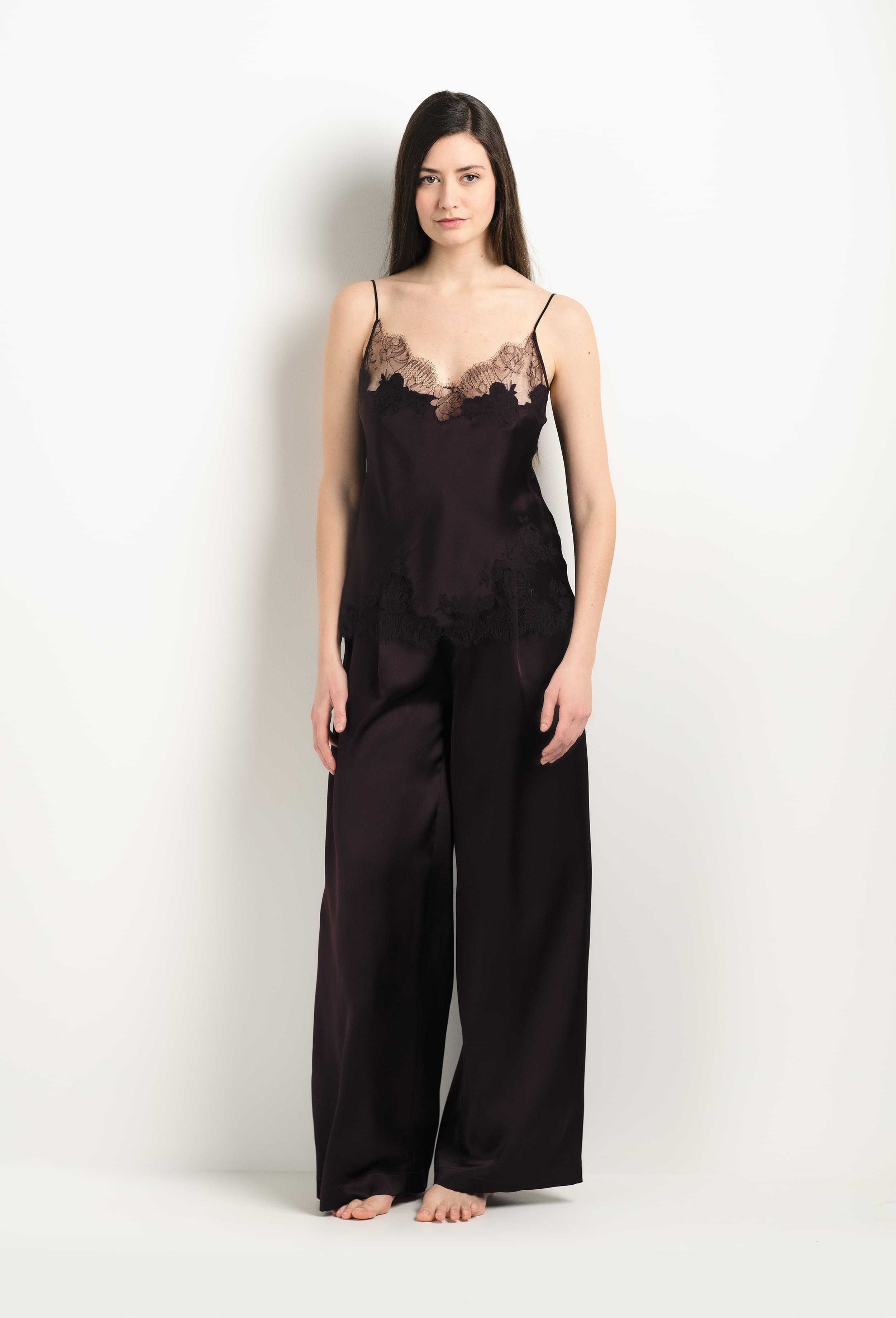 Enter Carine Gilson's world and the most beautiful silk lingerie with the 2025 Winter collection with this Camisole V Neckline in Ebony Silk  with Ebony lace