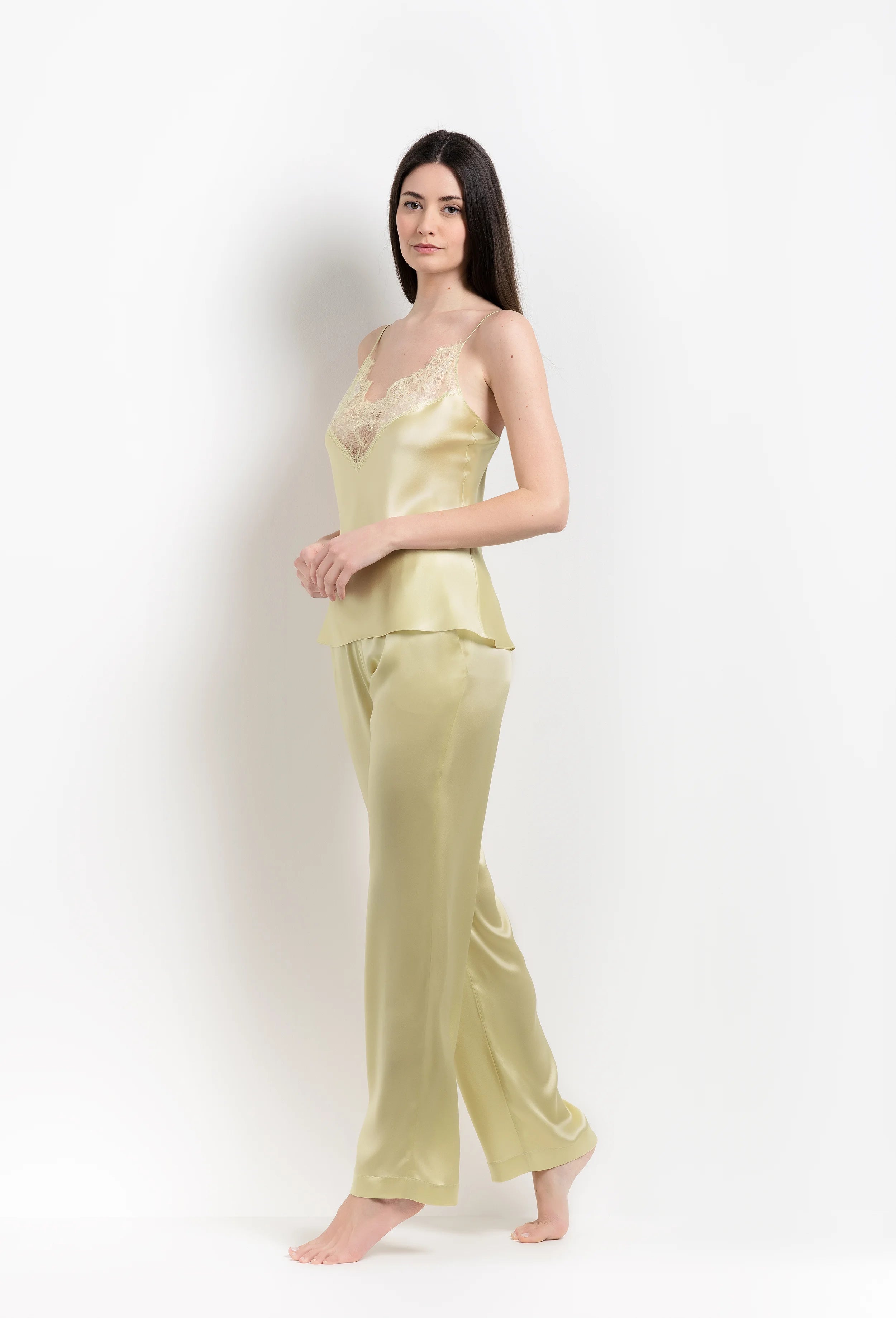 The 2026 Summer collection from the house Carine Gilson - The most beautiful couture lingerie to be discovered with this classic camisole in light yellow silk with acid yellow lace