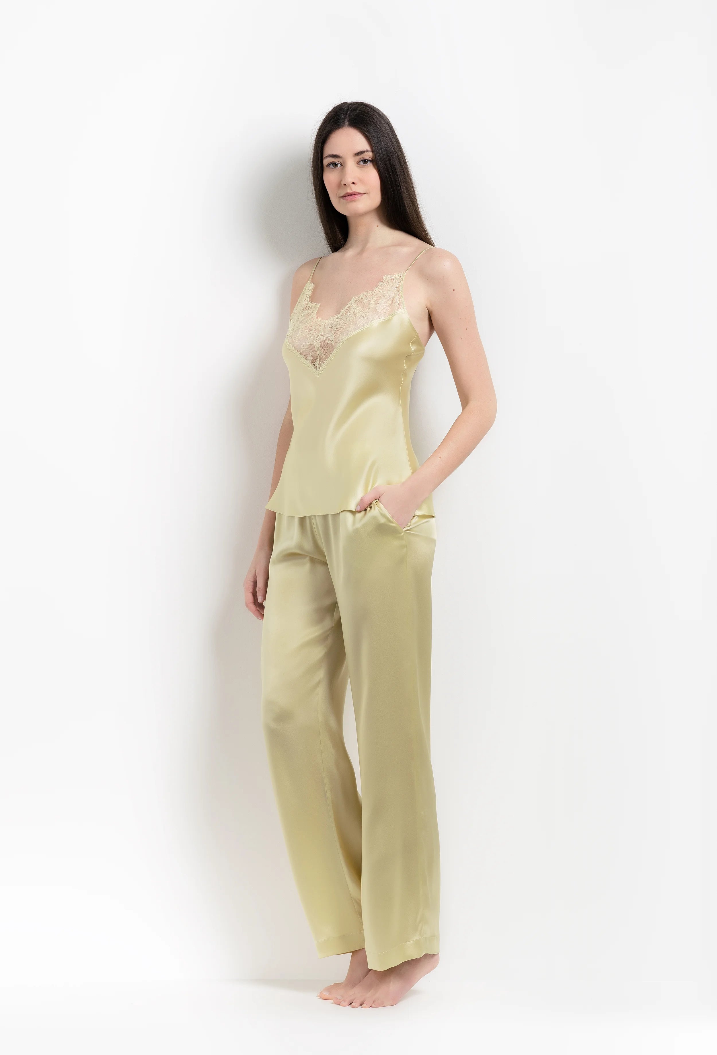 The 2026 Summer collection from the house Carine Gilson - The most beautiful couture lingerie to be discovered with this classic camisole in light yellow silk with acid yellow lace