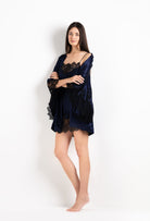 The 2026 Cruise collection from the house Carine Gilson - The most beautiful couture lingerie to be discovered with this Short Kimono Butterfly Sleeves in Dark Marine Blue Silk  with black lace