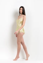 Enter Carine Gilson's world and the most beautiful silk lingerie with the 2026 Summer collection with this camisole classic style silk and lace in light yellow silk with acid yellow lace