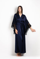 Discover the 2026 Cruise collection of silk and lace couture from the house Carine Gilson with this Long Kimono Butterfly Sleeves in Dark Marine Blue Silk  with black lace