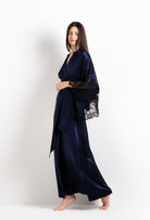 Discover the 2026 Cruise collection of silk and lace couture from the house Carine Gilson with this Long Kimono Butterfly Sleeves in Dark Marine Blue Silk  with black lace