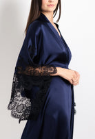 Discover the 2026 Cruise collection of silk and lace couture from the house Carine Gilson with this Long Kimono Butterfly Sleeves in Dark Marine Blue Silk  with black lace