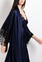 Discover the 2026 Cruise collection of silk and lace couture from the house Carine Gilson with this Long Kimono Butterfly Sleeves in Dark Marine Blue Silk  with black lace