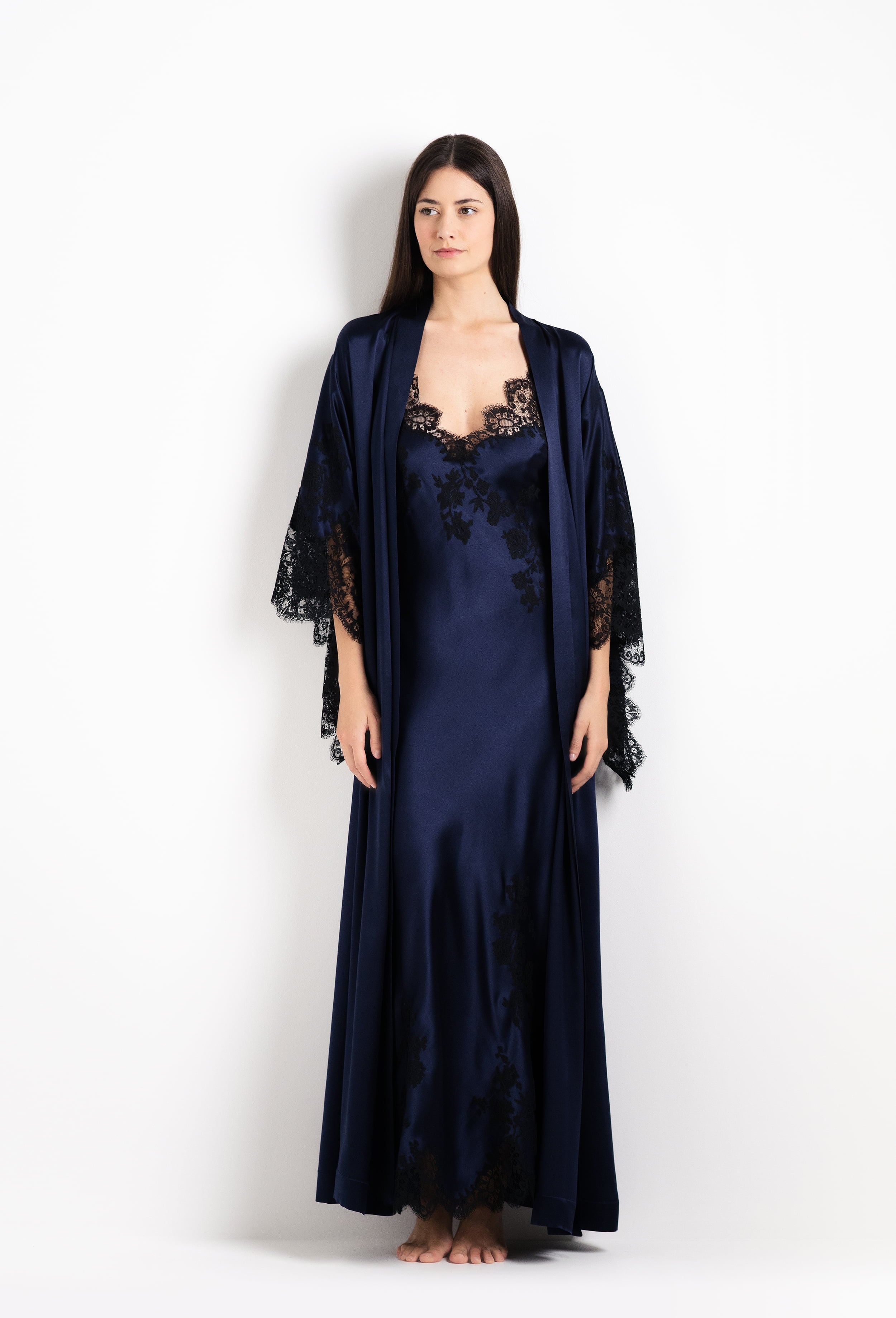 Discover the 2026 Cruise collection of silk and lace couture from the house Carine Gilson with this Long Kimono Butterfly Sleeves in Dark Marine Blue Silk  with black lace