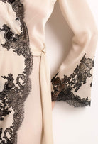 Explore the lingerie collection Summer 2022 from the house Carine Gilson with this Long Déshabillé Skyfall in sand beige Silk with Black lace