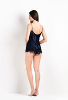Discover the unique craftmanship of the belgian designer Carine Gilson in her atelier for the 2026 Cruise collection with this Floaty Shorts in Dark Marine Blue Silk  with black lace