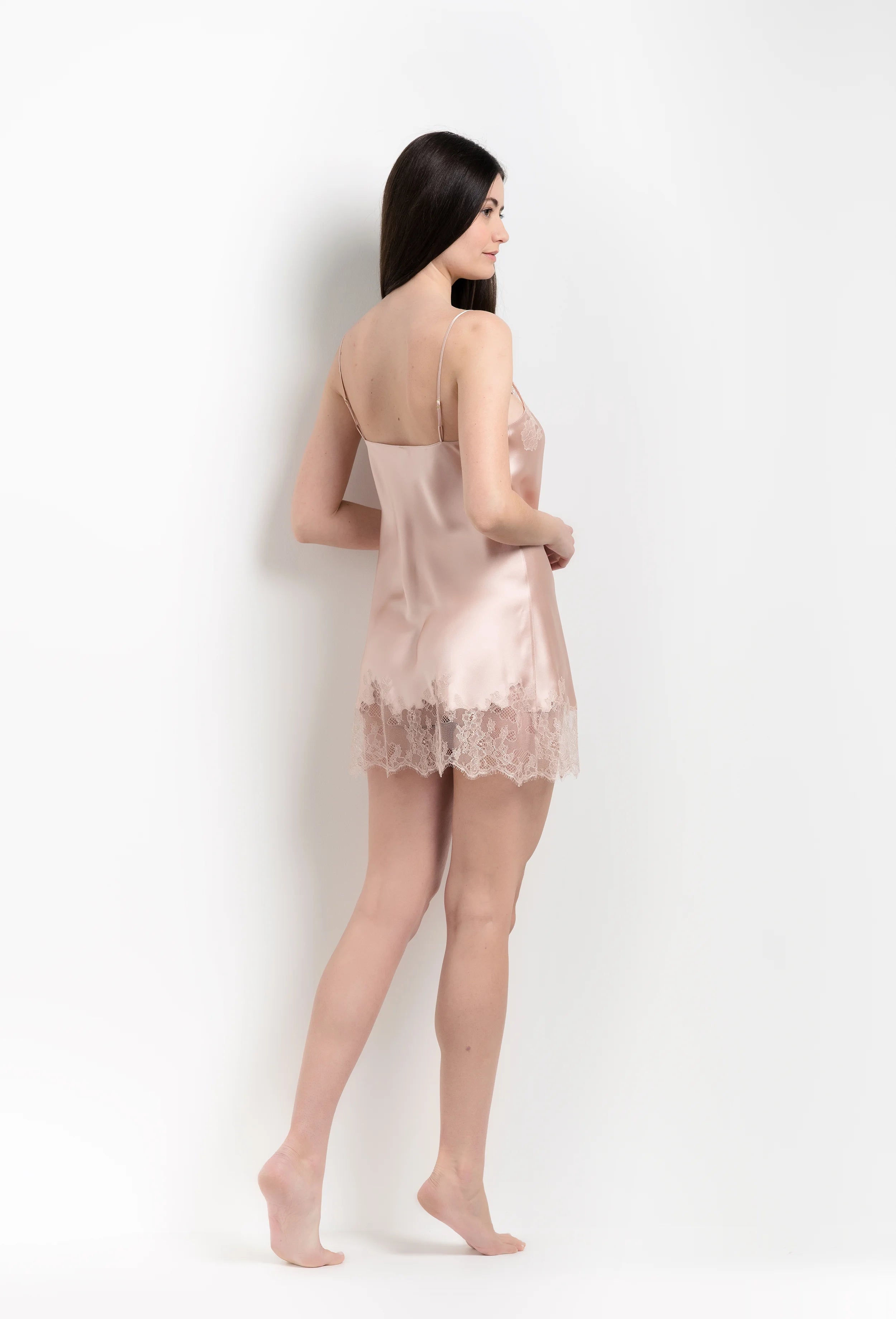 Discover the 2026 Summer collection of lingerie couture from the house Carine Gilson with this slip babydoll style straight neckline in light rose silk with pink rose lace
