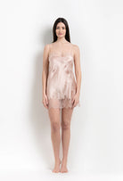 Discover the 2026 Summer collection of lingerie couture from the house Carine Gilson with this slip babydoll style straight neckline in light rose silk with pink rose lace