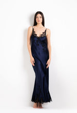 Made of silk and lace, explore the 2026 Cruise collection  from the house Carine Gilson with this Long Gown V Neckline in Dark Marine Blue Silk  with black lace