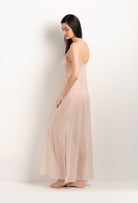 Discover the unique craftmanship of the belgian designer Carine Gilson in her atelier for the 2025 Summer collection with this Long Gown V Neckline in powder pink Silk  with light rose lace