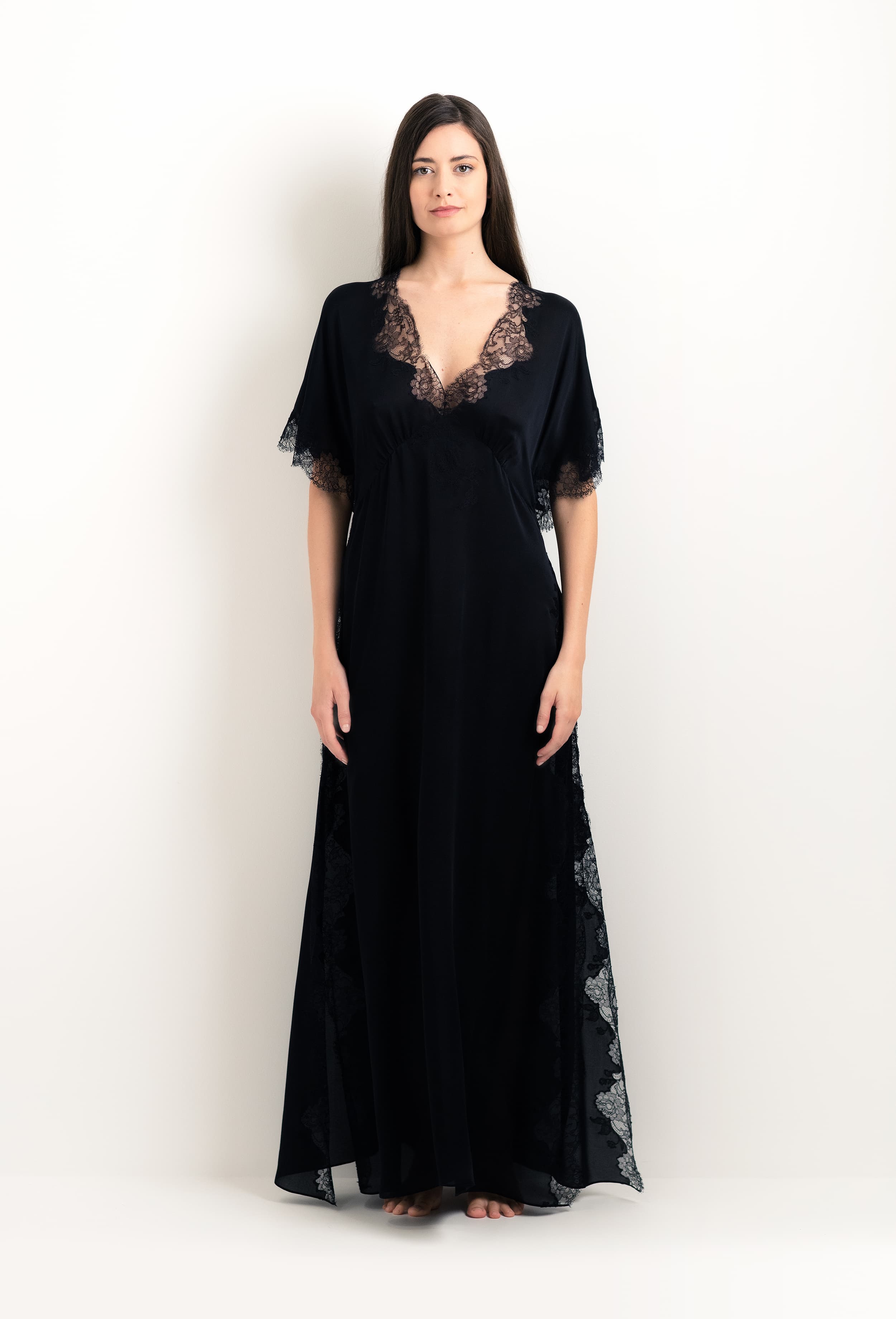 The 2025 cruise collection from the house Carine Gilson - The most beautiful couture lingerie to be discovered with this Kaftan Silk Satin with Lace in Black Silk  with Black lace