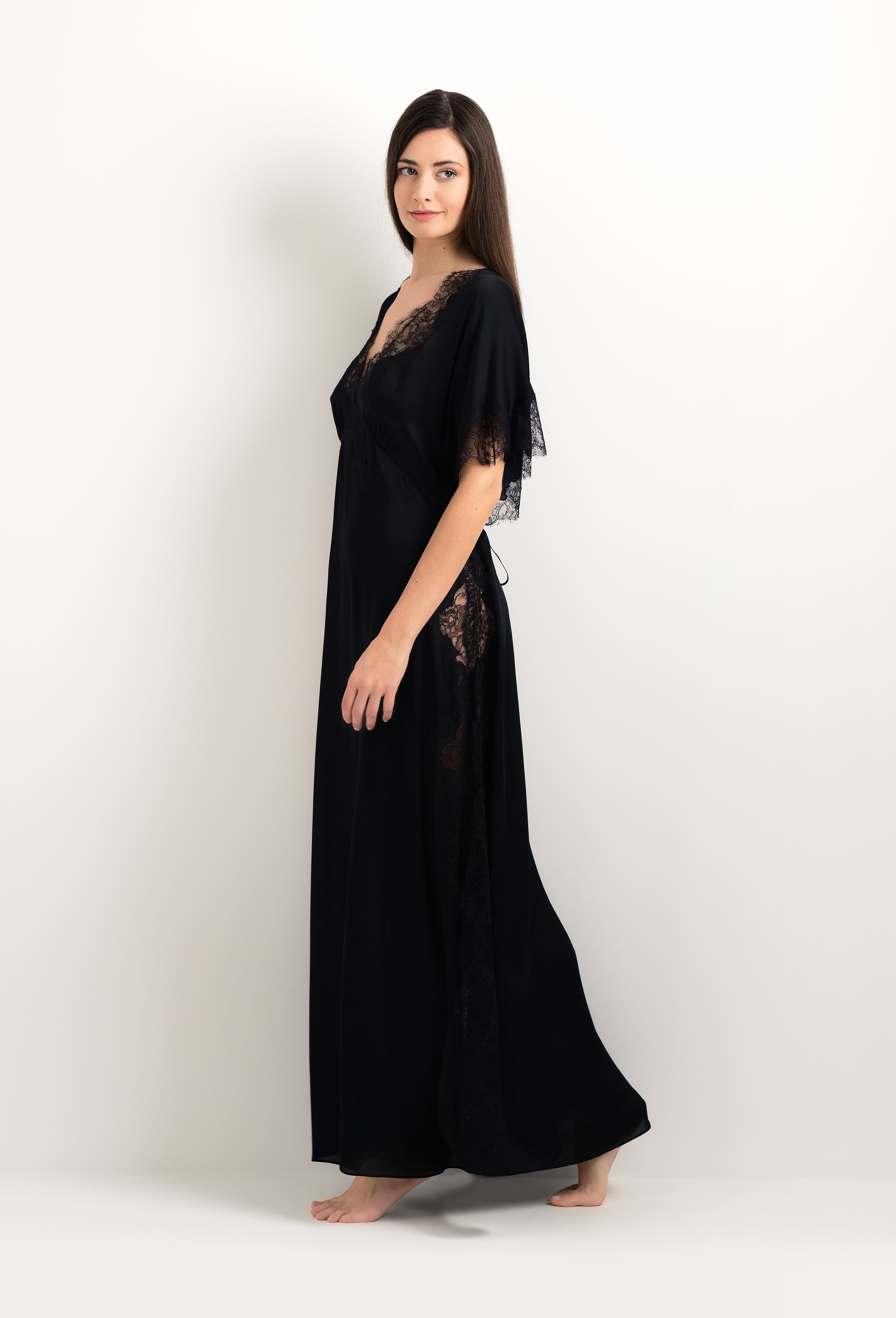 The 2025 cruise collection from the house Carine Gilson - The most beautiful couture lingerie to be discovered with this Kaftan Silk Satin with Lace in Black Silk  with Black lace