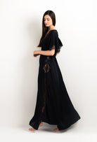 The 2025 cruise collection from the house Carine Gilson - The most beautiful couture lingerie to be discovered with this Kaftan Silk Satin with Lace in Black Silk  with Black lace