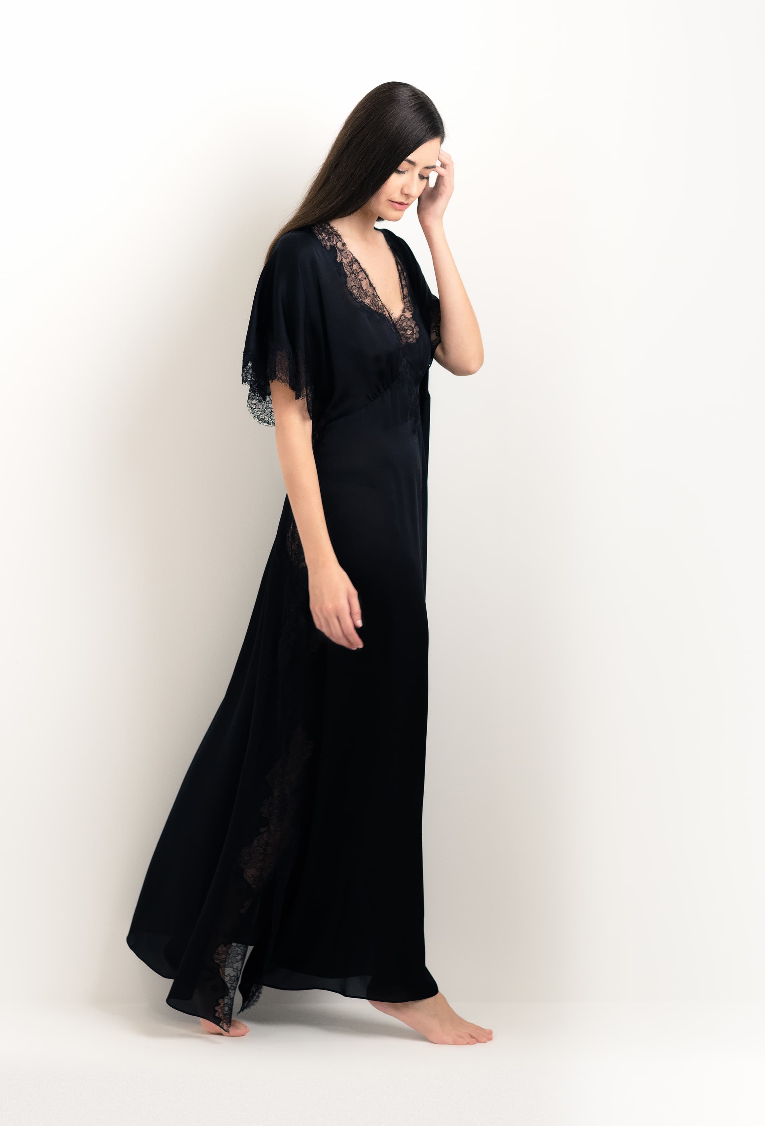 The 2025 cruise collection from the house Carine Gilson - The most beautiful couture lingerie to be discovered with this Kaftan Silk Satin with Lace in Black Silk  with Black lace