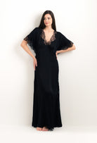 The 2025 cruise collection from the house Carine Gilson - The most beautiful couture lingerie to be discovered with this Kaftan Silk Satin with Lace in Black Silk  with Black lace