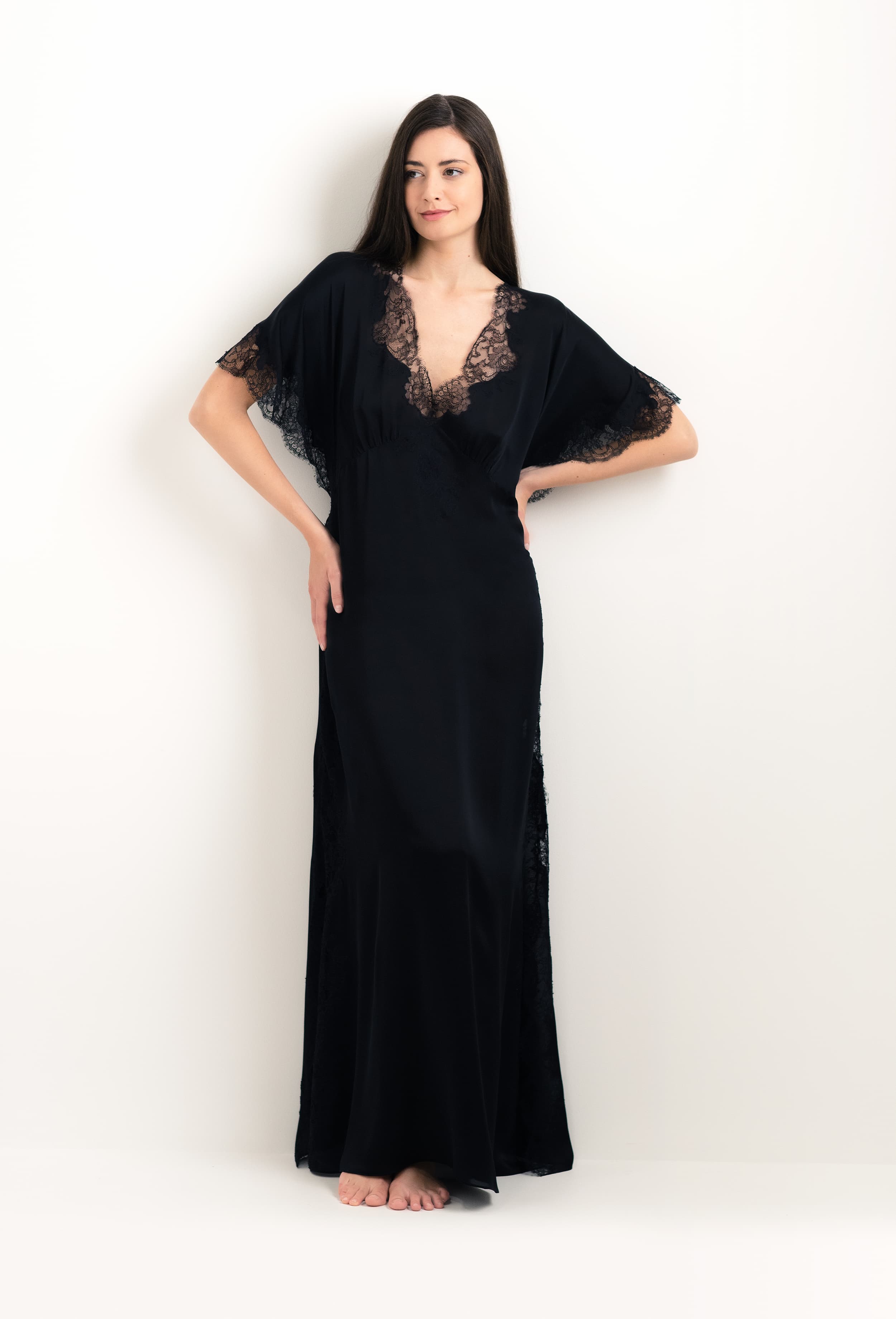 The 2025 cruise collection from the house Carine Gilson - The most beautiful couture lingerie to be discovered with this Kaftan Silk Satin with Lace in Black Silk  with Black lace