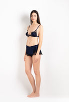 Discover the unique craftmanship of the belgian designer Carine Gilson in her atelier for the 2026 Cruise collection with this Floaty Shorts in Dark Marine Blue Silk  with black lace