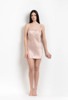 Enjoy the 2026 Summer collection of lingerie couture from the house Carine Gilson with this slip babydoll style straight neckline in light rose silk with pink rose lace