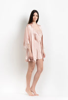 The 2026 Summer collection from the house Carine Gilson - The most beautiful couture lingerie to be discovered with this short kimono classic sleeves in light rose silk with pink rose lace