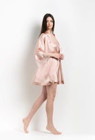 The 2026 Summer collection from the house Carine Gilson - The most beautiful couture lingerie to be discovered with this short kimono classic sleeves in light rose silk with pink rose lace