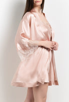 The 2026 Summer collection from the house Carine Gilson - The most beautiful couture lingerie to be discovered with this short kimono classic sleeves in light rose silk with pink rose lace