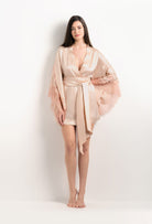 The 2025 Summer collection from the house Carine Gilson - The most beautiful couture lingerie to be discovered with this Short Kimono Butterfly Sleeves in powder pink Silk  with light rose lace