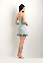 Discover the 2024 winter collection of lingerie couture from the house Carine Gilson with this Slip Babydoll Style V Neckline in grey blue Silk with emerald green lace