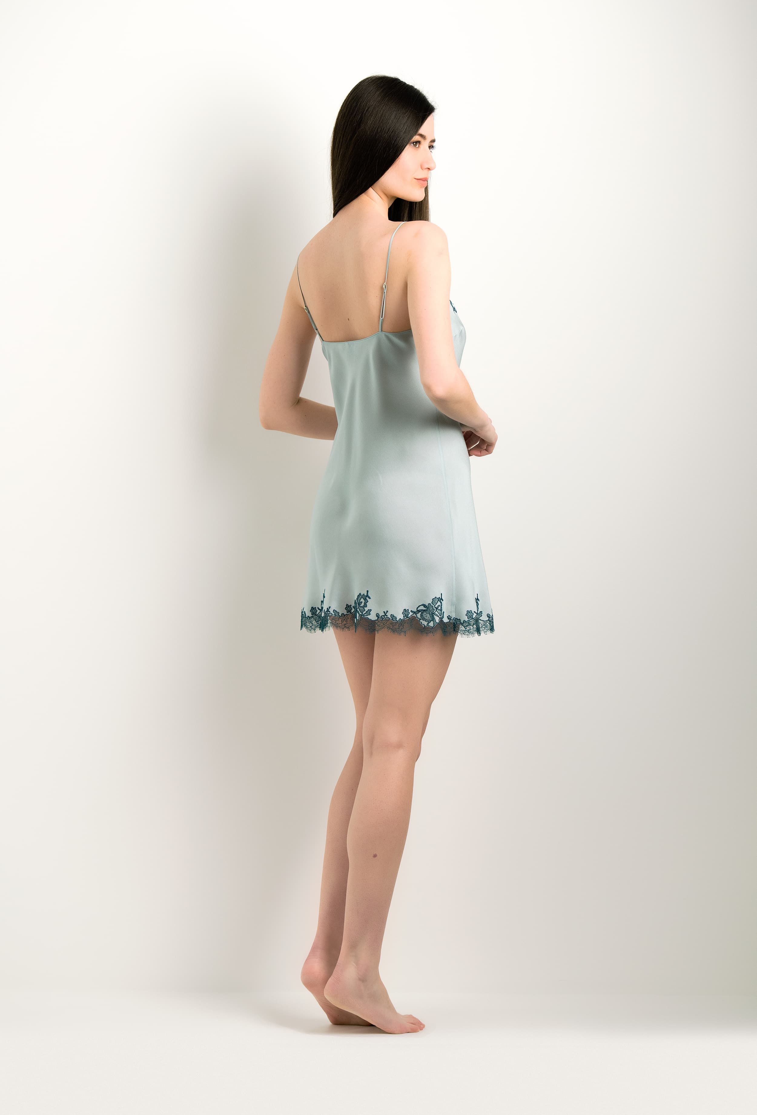 Discover the 2024 winter collection of lingerie couture from the house Carine Gilson with this Slip Babydoll Style V Neckline in grey blue Silk with emerald green lace