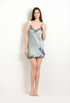 Discover the 2024 winter collection of lingerie couture from the house Carine Gilson with this Slip Babydoll Style V Neckline in grey blue Silk with emerald green lace