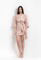 Enter Carine Gilson's world and the most beautiful silk lingerie with the 2026 Summer collection with this short kimono classic sleeves in light rose silk with pink rose lace