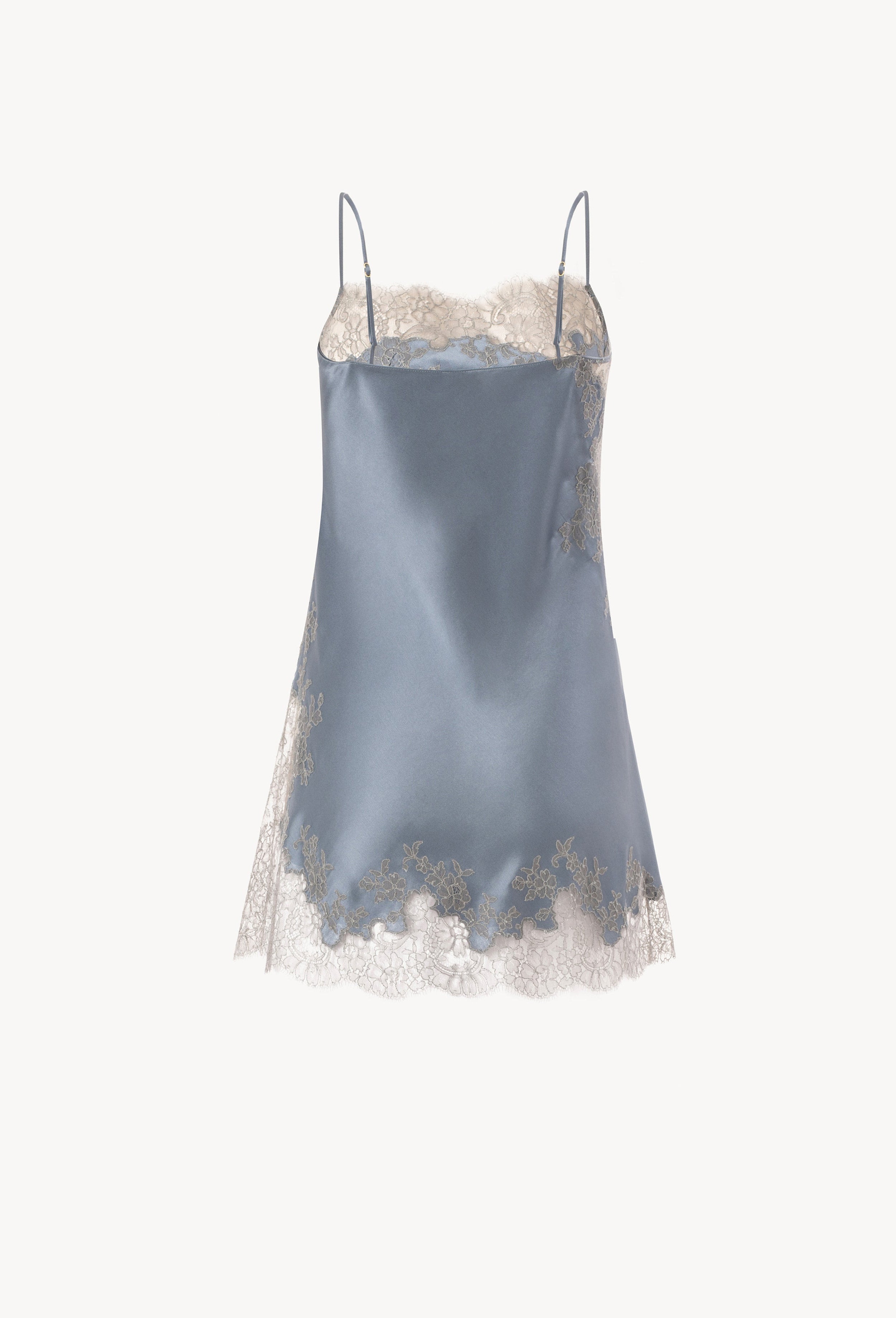 The Hiver 2026-27 collection from the house Carine Gilson - The most beautiful couture lingerie to be discovered with this babydoll style straight neckline in blue stone silk  with grey lace