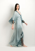 Discover the 2024 winter collection of lingerie couture from the house Carine Gilson with this Long Kimono Classic Sleeves in grey blue Silk with emerald green lace