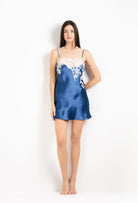 Discover the 2026 Cruise collection of silk and lace couture from the house Carine Gilson with this silk mini dress with straight neckline in Azur with Natural lace
