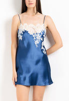 Discover the 2026 Cruise collection of silk and lace couture from the house Carine Gilson with this silk mini dress with straight neckline in Azur with Natural lace