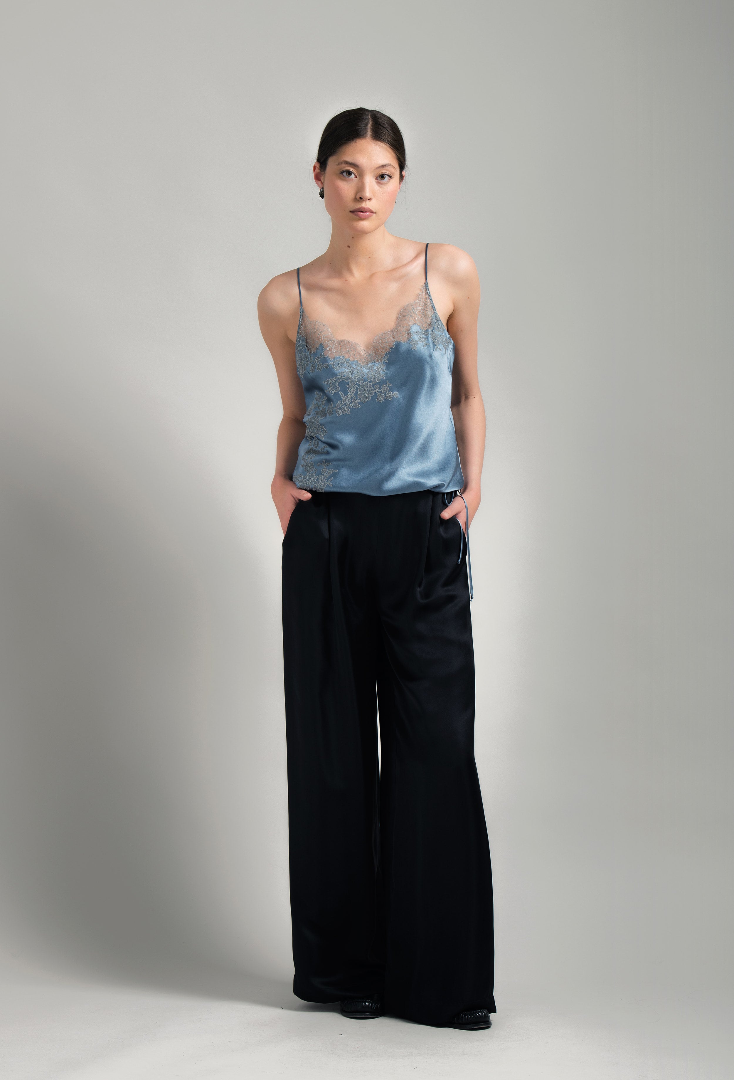 Discover the Hiver 2026-27 collection of lingerie couture from the house Carine Gilson with this camisole classic in blue stone silk  with grey lace