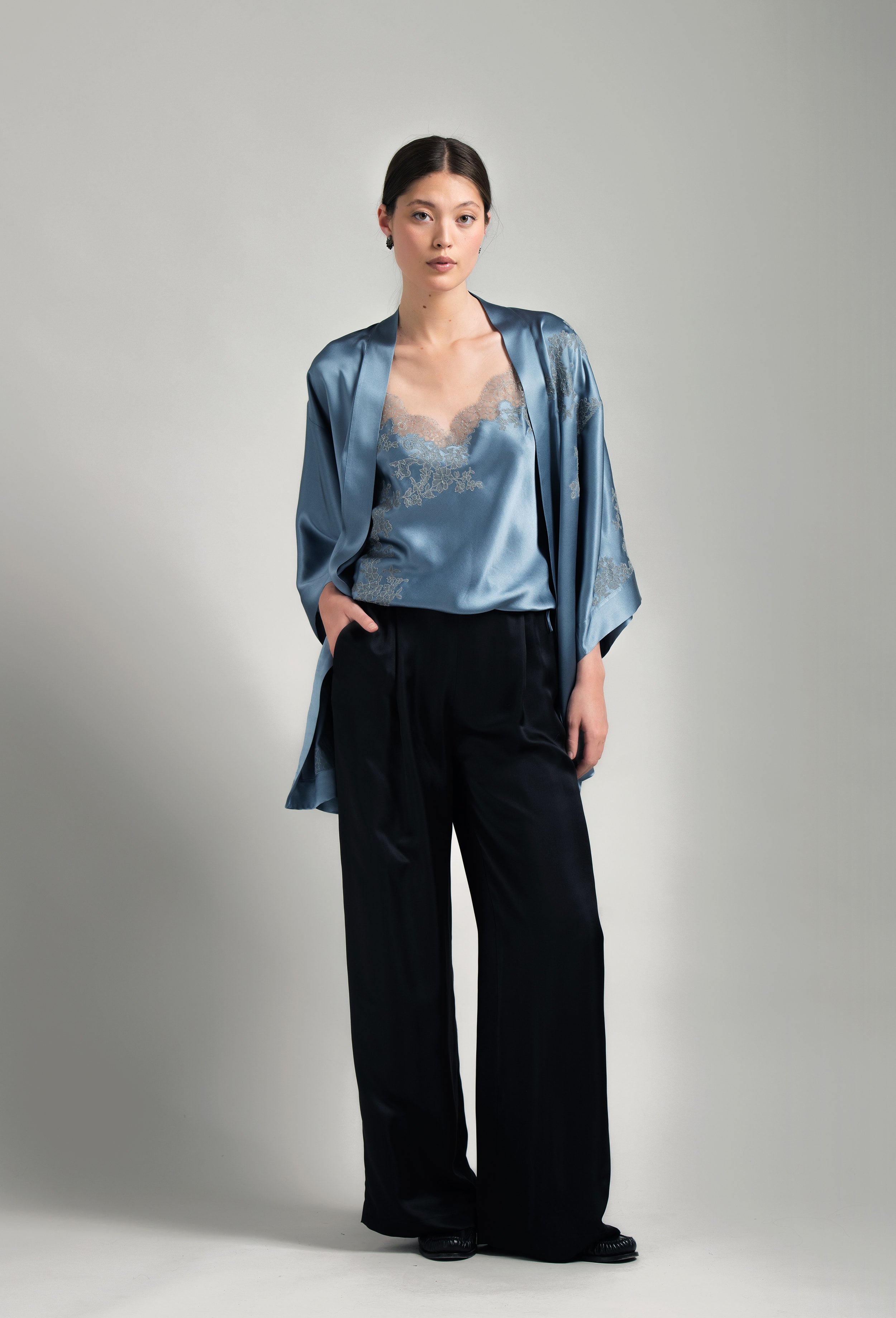 Discover the Hiver 2026-27 collection of lingerie couture from the house Carine Gilson with this camisole classic in blue stone silk  with grey lace