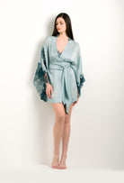 Made of silk and lace, explore the lingerie collection 2024 winter from the house Carine Gilson with this Short Kimono Butterfly Sleeves in grey blue Silk with emerald green lace